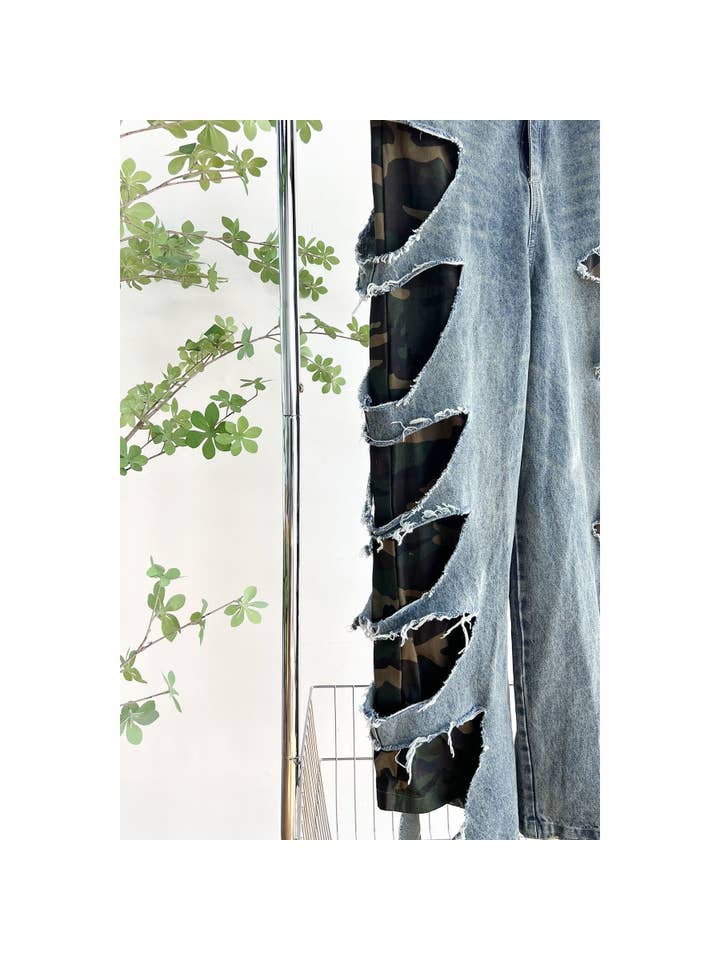 Distressed denim camo pants